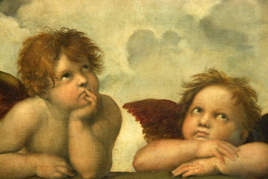 Famosos angelitos, detalle del cuadro la Madona Sixtina