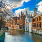 belfort and the green canal in bruges belgium picture id470770116 150x150