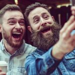 two bearded friends drinking coffee and taking selfie in restaurant picture id869915412 150x150